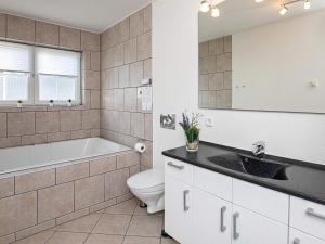 5 person holiday home on a holiday park in Bogense