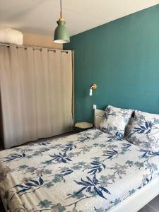Appartements Au Champ Fleuri : photos des chambres