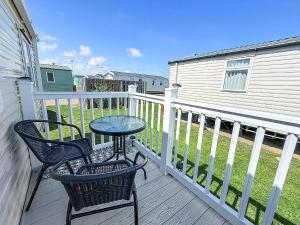 Lovely Caravan With Decking To The Side At California Cliffs Ref 50072D