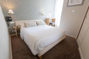 Hotels Cit'Hotel Les Alizes : photos des chambres