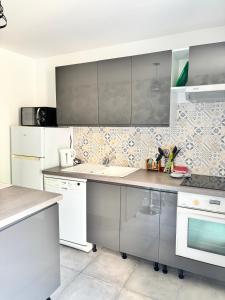 Appartements Au Champ Fleuri : photos des chambres