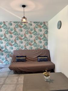 Appartements Au Champ Fleuri : photos des chambres
