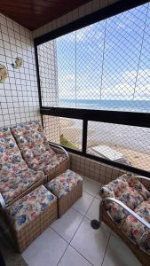 Apartamento de Frente para a Praia - Vila Caiçara