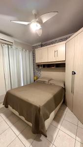 Apartamento de Frente para a Praia - Vila Caiçara