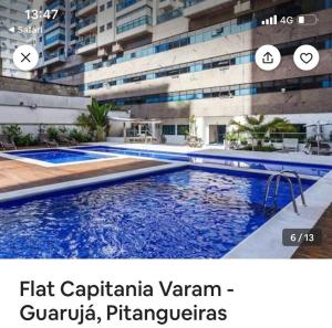 Flat charmoso com vista parcial ao mar