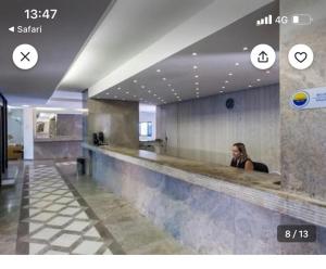 Flat charmoso com vista parcial ao mar