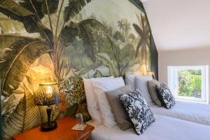 Maisons d'hotes Les 13 lavoirs d-antan - chambre globe-trotteur : photos des chambres