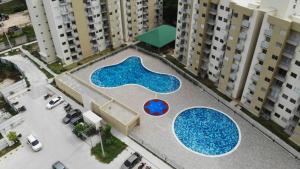 Apartamento Vacacional con Piscina WiFi y Netflix a 20 min del Parque Tayrona ideal para trabajo remoto