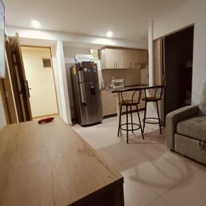 Apartamento Vacacional con Piscina WiFi y Netflix a 20 min del Parque Tayrona ideal para trabajo remoto
