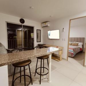 Apartamento Vacacional con Piscina WiFi y Netflix a 20 min del Parque Tayrona ideal para trabajo remoto