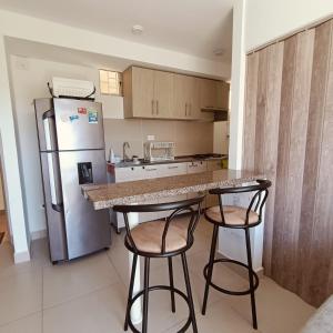 Apartamento Vacacional con Piscina WiFi y Netflix a 20 min del Parque Tayrona ideal para trabajo remoto