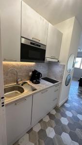 Appartements Charmant studio climatise, proche de la plage : photos des chambres