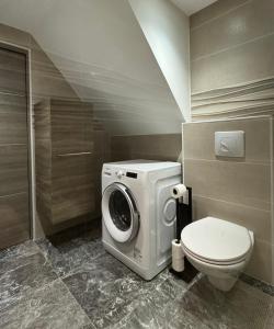 Appartements Logement cosy avec piscine et jacuzzi prive : photos des chambres