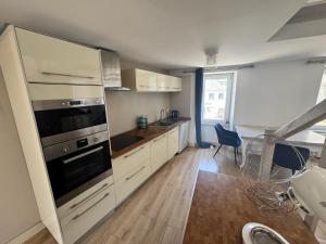 Appartements Duplex centre bourg a 5min des plages : photos des chambres