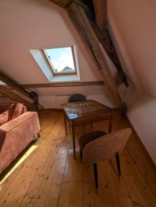Appartements Appartement comble en centre ville de Belleme : photos des chambres