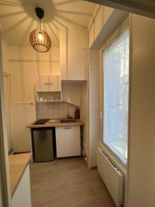 Appartements T2 cozy en centre-ville : photos des chambres
