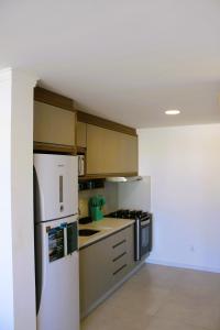 Apto de duas suítes com vista mar - 100 metros da praia em Canasvieiras