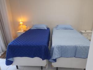 Flat com vista parcial ao mar