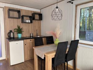 Resort EDEN - domki, pokoje, apartamenty