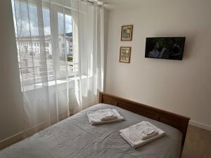 Appartements La Jonquille, Appartement Centre Ville de Gerardmer, linge et menage inclus : photos des chambres
