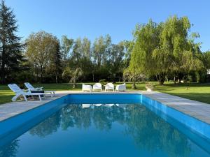Appartements Appartement familial au bord de la Marne, jardin tropical , piscine, tennis, terrasse, parking gratuit proche Disneyland : photos des chambres