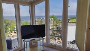 Seaside chalet in Ardmore with breathtaking views