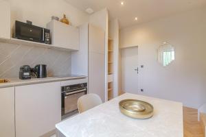 Appartements Superbe appartement lumineux proche de Lyon : photos des chambres