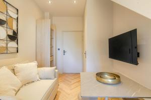 Appartements Appartement moderne et chaleureux, Ecully : photos des chambres