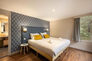 Villages vacances Center Parcs Les Hauts de Bruyeres : photos des chambres