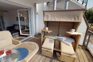 Villa Meeresrauschen Carpe Diem mit großzügiger Terrasse und extragroßem Strandkorb