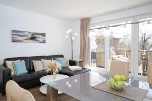 Villa Meeresrauschen Carpe Diem mit großzügiger Terrasse und extragroßem Strandkorb