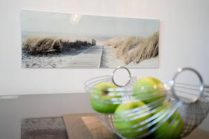 Villa Meeresrauschen Carpe Diem mit großzügiger Terrasse und extragroßem Strandkorb