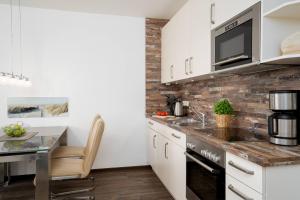 Villa Meeresrauschen Carpe Diem mit großzügiger Terrasse und extragroßem Strandkorb