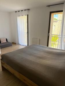 Appartements neufs avec garages dans maison de village : photos des chambres
