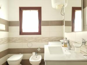 Residenza Monte Rena - Rena A3 - Budoni Sweet Home