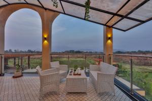 SaffronStays Episode - 5BR pet-friendly pool villa with themed rooms, cabana, bonfire & turf for sports near Karjat River