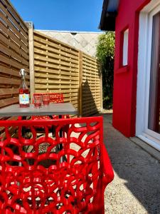 Maisons de vacances La petite maison rouge : photos des chambres