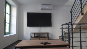 Appartements Maison cosy : photos des chambres