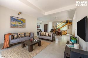 StayVista at Villa Aruvi with Bonfire, Lawn