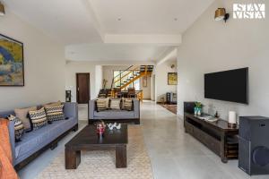 StayVista at Villa Aruvi with Bonfire, Lawn