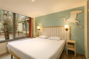Villages vacances Center Parcs Les Hauts de Bruyeres : photos des chambres
