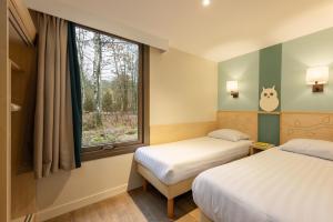 Villages vacances Center Parcs Les Hauts de Bruyeres : photos des chambres