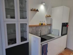 Appartements La maison du quai : photos des chambres