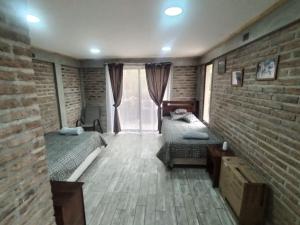 Hosteria y Cabañas Malloa - Naturaleza y Desconexión