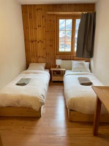 Grand appartement calme avec vue, balcon et parking couvert