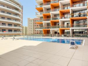 VayK - Stylish Studio with Pool View in Silicon Oasis