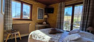 Hotels Les 4 Saisons : photos des chambres