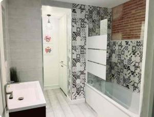 Appartements La maison des remparts : photos des chambres