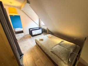 Appartements Le Pavillon des Remparts - Commerces a proximite - Centre-ville - Appartement Cosy : photos des chambres