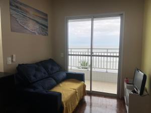 Apartamento com piscina, churrasqueira na varanda frente a praia